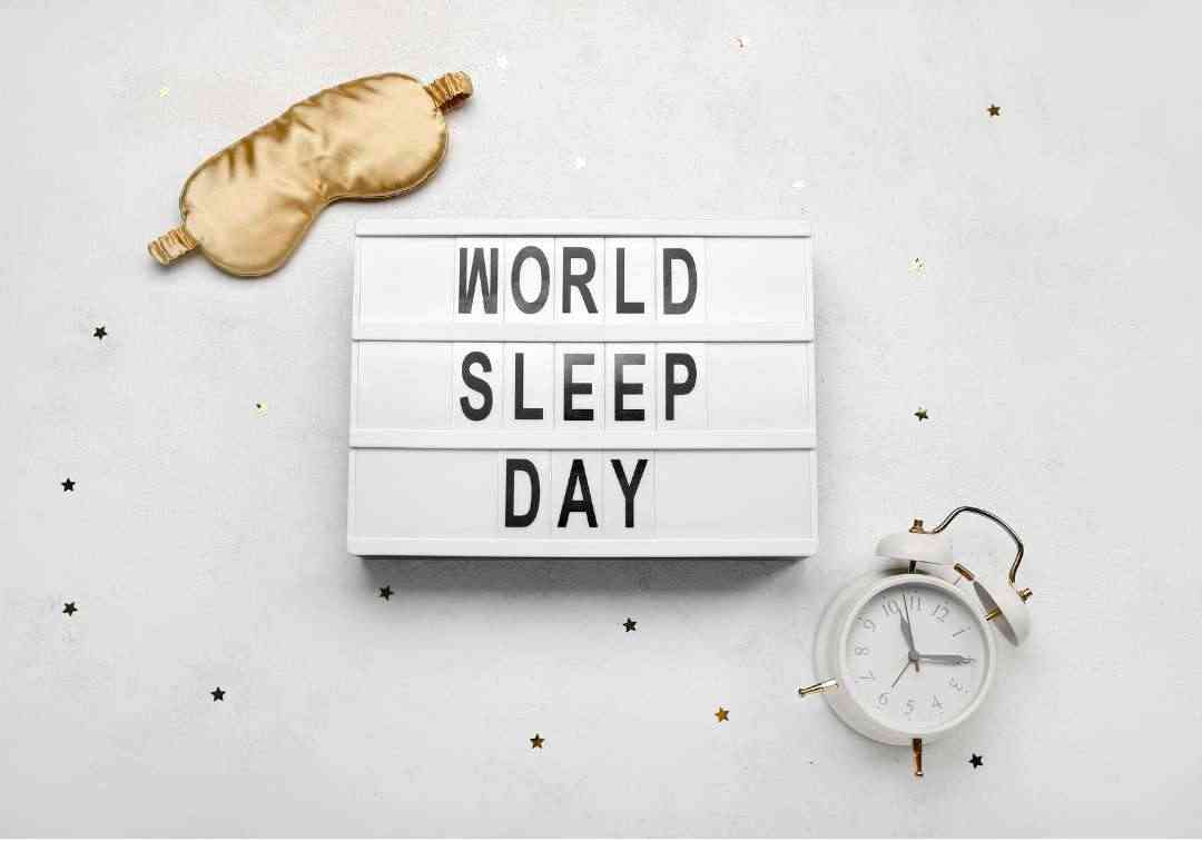 World Sleep Day: An eye mask and alarm clock symbolising a consistent nighttime routine and restful sleep.