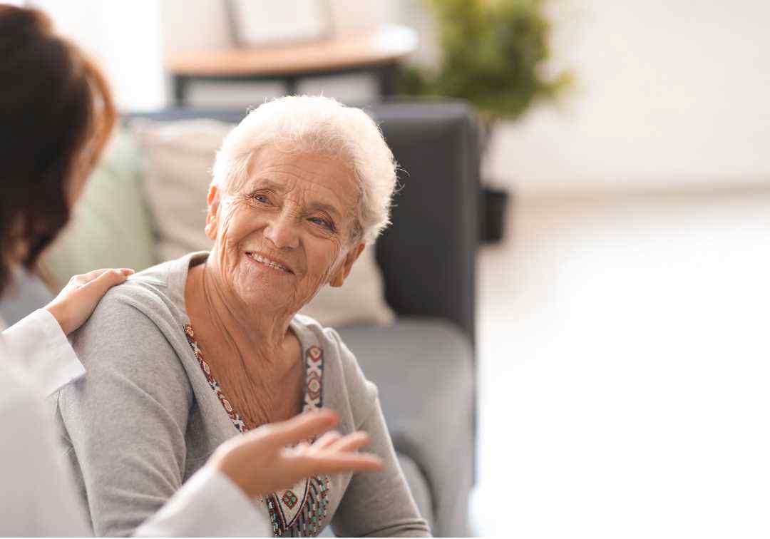 Support advisor providing clear guidance on support at home services and rates to a client.